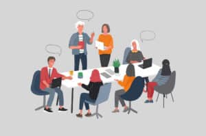 A group of people in office talking to each other in inclusive language